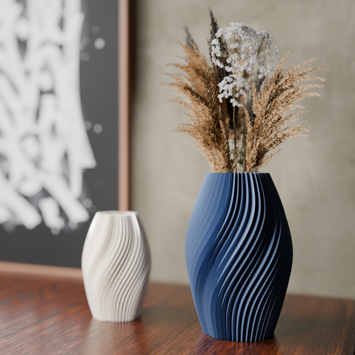 A small white Ascera design vase and a large blue vase with dried flowers